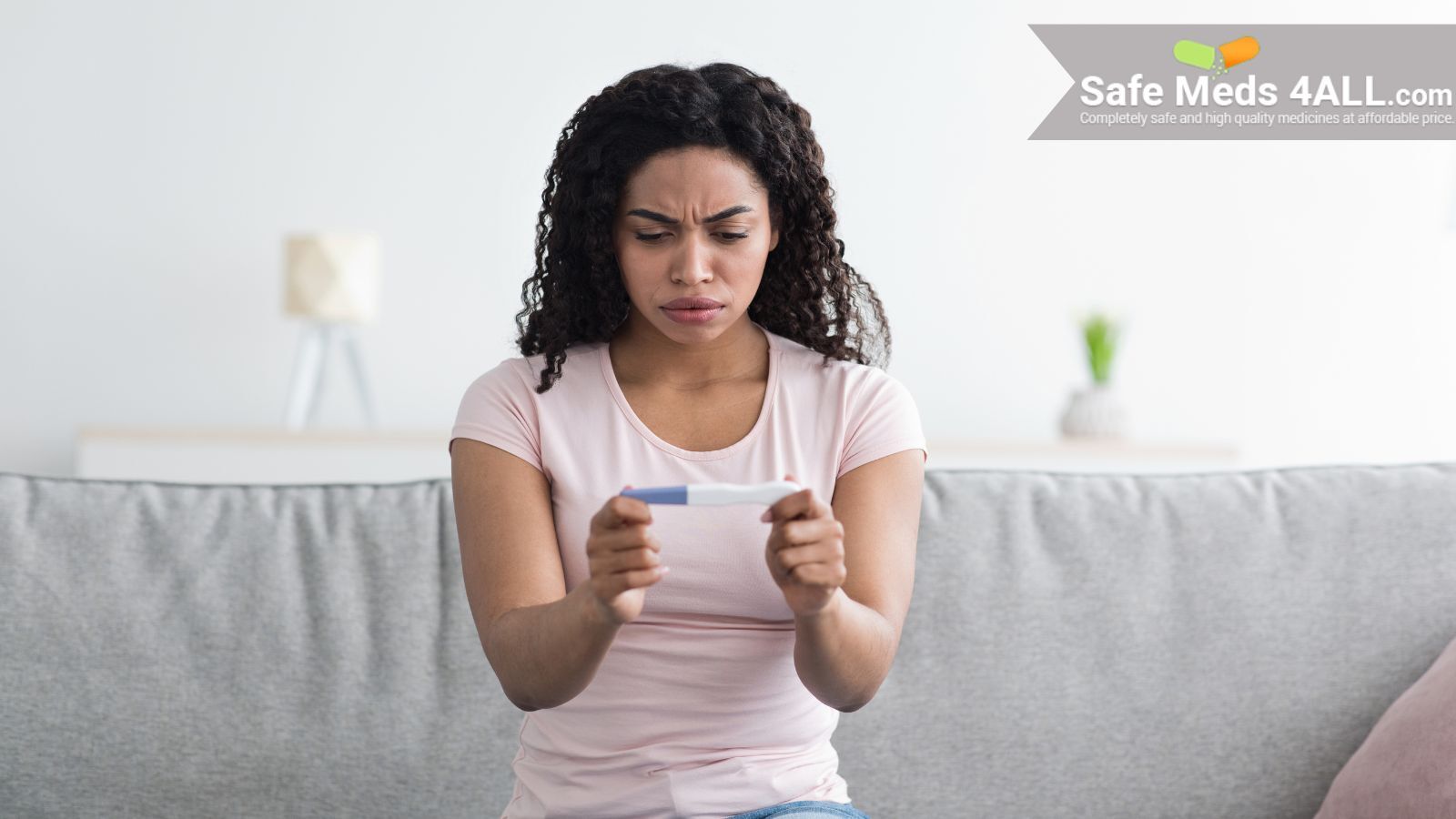 A female testing pregnancy, using pregnancy kit.