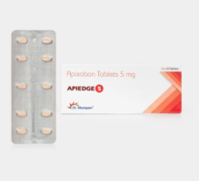 A box and a strip of generic Apixaban (5mg) tablets